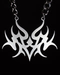 Klasyczny wisior Vandal Jewelry: customowa biżuteria i breloki ze stali nierdzewnej w estetyce Y2K. Unikatowy design wycinany laserowo.