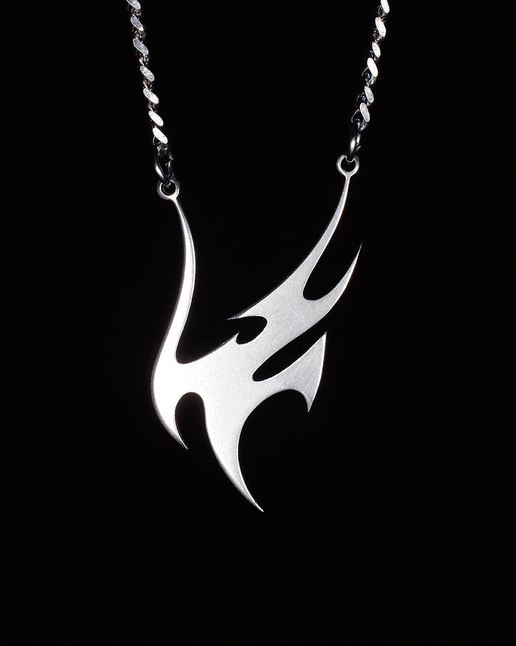 Logotyp Vandal Jewelry: customowa biżuteria i breloki ze stali nierdzewnej w estetyce Y2K. Unikatowy design wycinany laserowo.