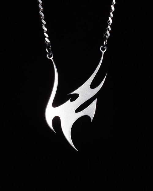 Logotyp Vandal Jewelry: customowa biżuteria i breloki ze stali nierdzewnej w estetyce Y2K. Unikatowy design wycinany laserowo.